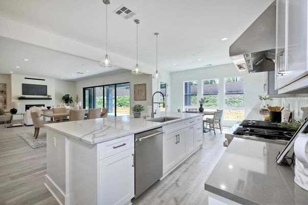 Dining room, Fireplace, Interior, Kitchen, Living room, Pendant Lights, Recessed Lighting, Stainless Steel Appliances, Wood Texture Flooring