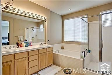 Bathroom, Dual Sink Vanities, Glass Shower, Interior, Recessed Lighting, Tile Countertops