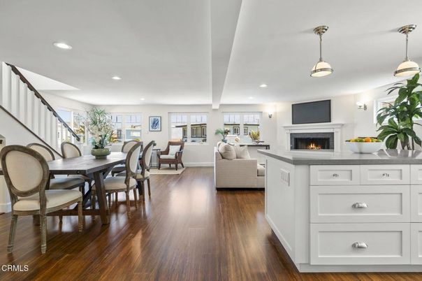 Dining room, Fireplace, Interior, Living room, Pendant Lights, Recessed Lighting, Wood Texture Flooring