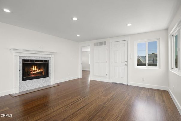 Empty room, Fireplace, Interior, Recessed Lighting, Wood Texture Flooring