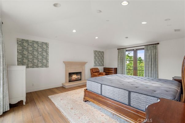 Bedroom, Fireplace, Interior, Recessed Lighting, Wood Texture Flooring