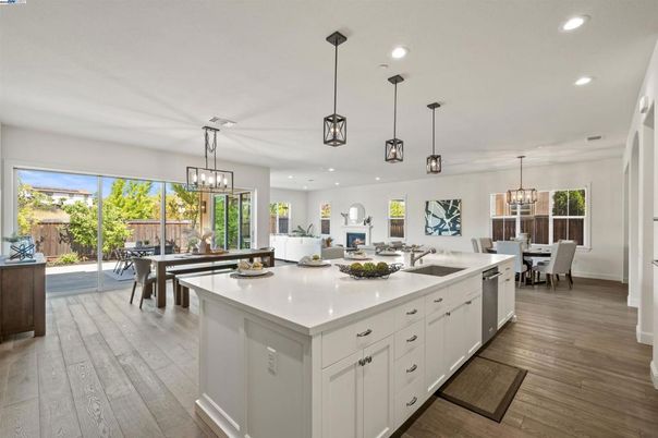Chandelier, Dining room, Fireplace, Interior, Kitchen, Pendant Lights, Recessed Lighting, Wood Texture Flooring