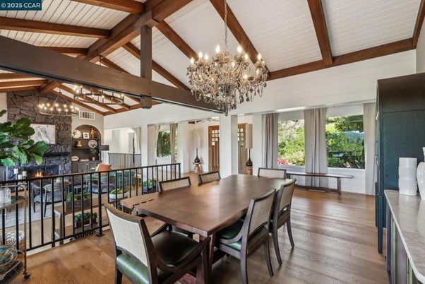 Chandelier, Dining room, Fireplace, Interior, Stone Walls, Wooden Beams, Wood Texture Flooring