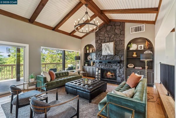 Chandelier, Fireplace, Interior, Living room, Pendant Lights, Stone Walls, Wooden Beams, Wood Texture Flooring