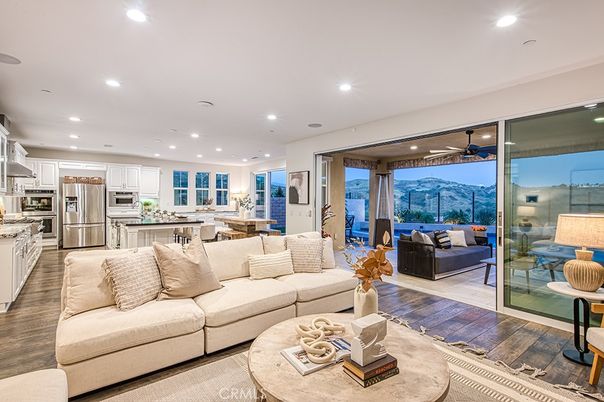 Dining room, Interior, Kitchen, Living room, Recessed Lighting, Stainless Steel Appliances, Wood Texture Flooring