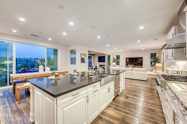 Dining room, Interior, Kitchen, Living room, Recessed Lighting, Stainless Steel Appliances, Wood Texture Flooring