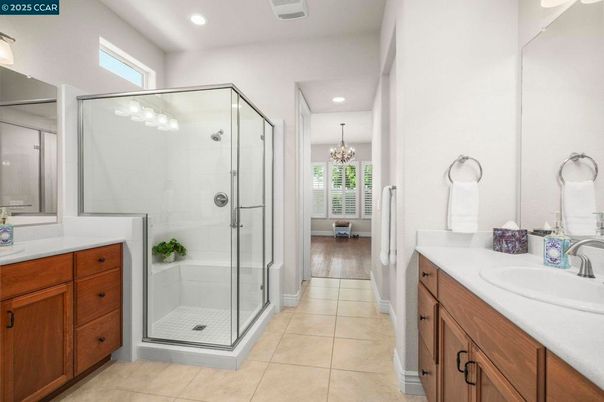 Bathroom, Chandelier, Dual Sink Vanities, Glass Shower, Interior, Recessed Lighting, Wood Texture Flooring