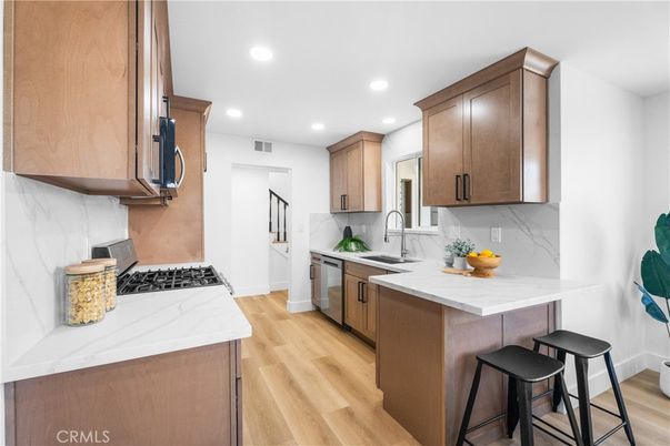 Interior, Kitchen, Marble Walls, Recessed Lighting, Wood Texture Flooring