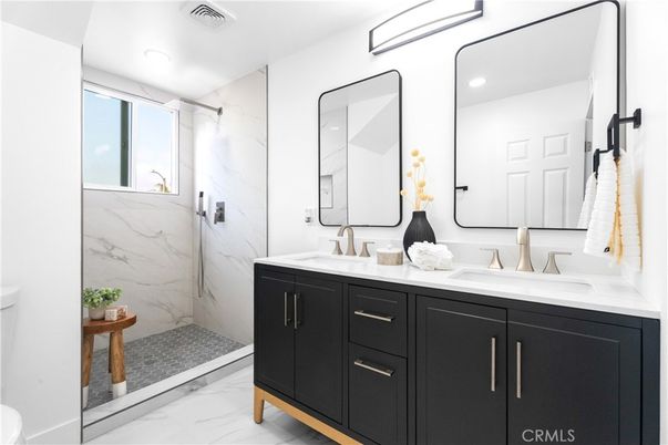 Bathroom, Dual Sink Vanities, Glass Shower, Interior, Marble, Marble Walls, Recessed Lighting