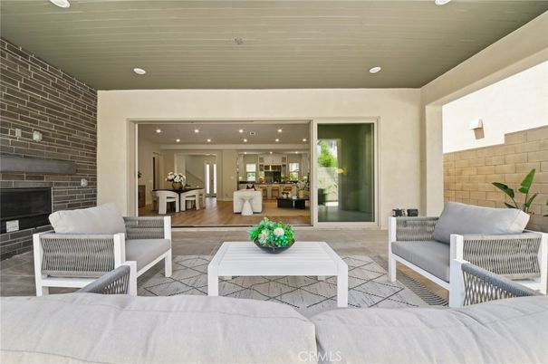 Fireplace, Interior, Living room, Recessed Lighting, Stone Walls, Wood Texture Flooring