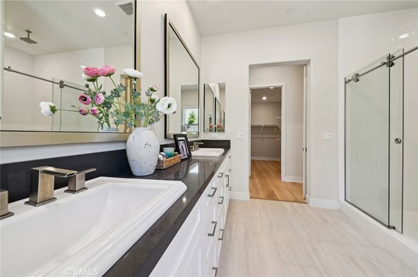 Bathroom, Dual Sink Vanities, Glass Shower, Interior, Recessed Lighting, Wood Texture Flooring