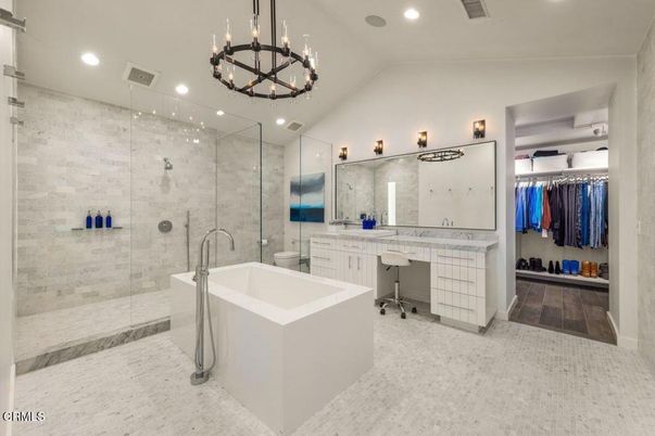 Bathroom, Chandelier, Dual Sink Vanities, Free Standing Baths, Glass Shower, Interior, Recessed Lighting, Walk-in Closets, Wood Texture Flooring
