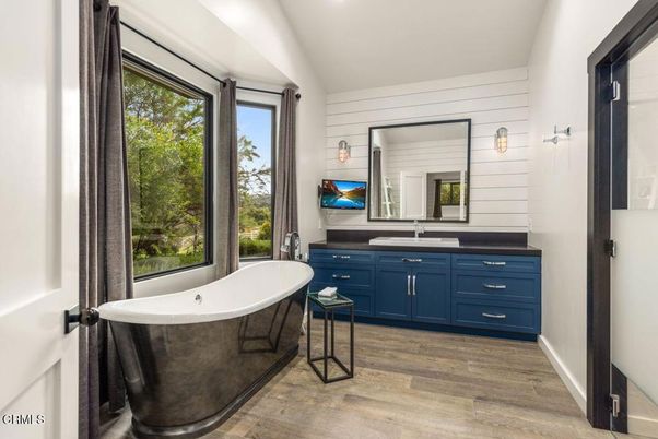 Bathroom, Dual Sink Vanities, Free Standing Baths, Interior, Recessed Lighting, Wood Texture Flooring