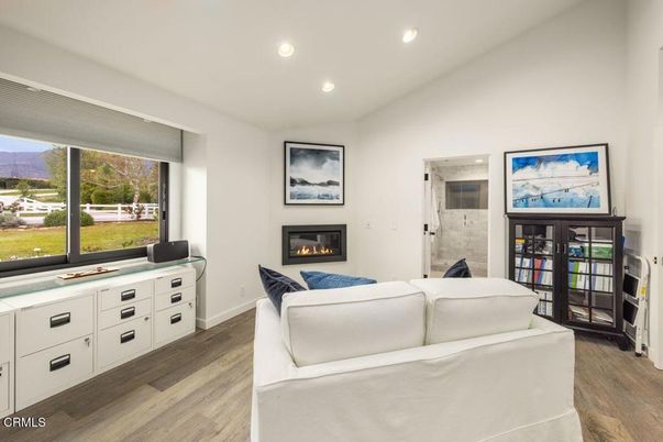 Bedroom, Fireplace, Interior, Recessed Lighting, Wood Texture Flooring