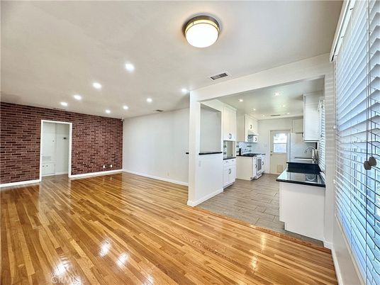 Empty room, Interior, Kitchen, Recessed Lighting, Stone Walls, Wood Texture Flooring