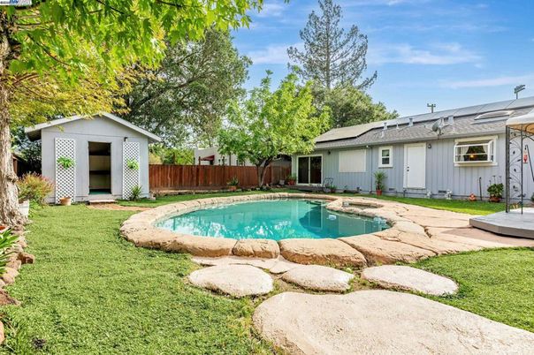 Exterior, Pool, Solar Panels