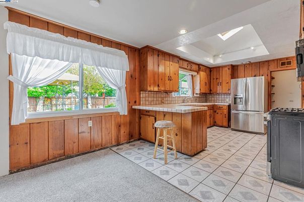 Interior, Kitchen, Recessed Lighting, Tile Countertops, Wooden Walls