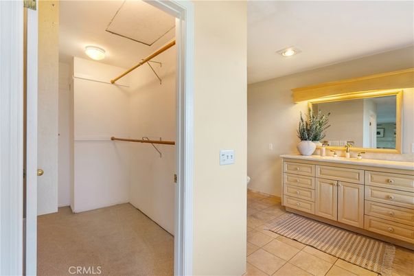 Bathroom, Dual Sink Vanities, Interior, Recessed Lighting, Walk-in Closets