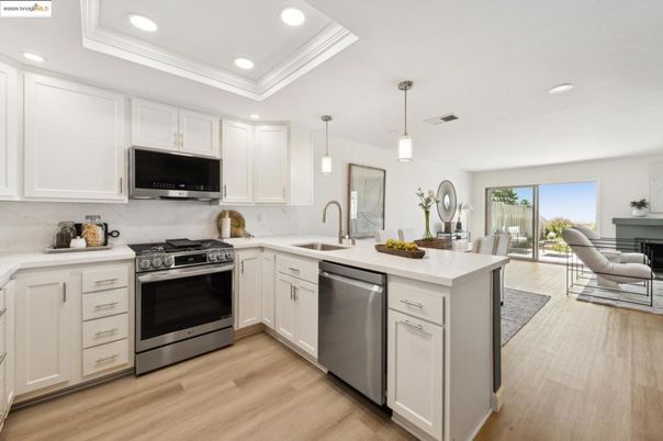 Interior, Kitchen, Pendant Lights, Recessed Lighting, Stainless Steel Appliances, Wood Texture Flooring