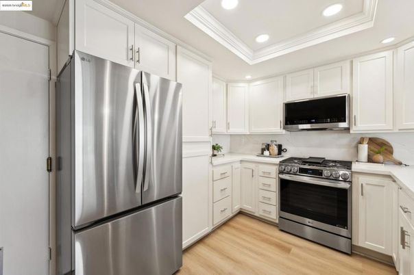Interior, Kitchen, Recessed Lighting, Stainless Steel Appliances, Wood Texture Flooring