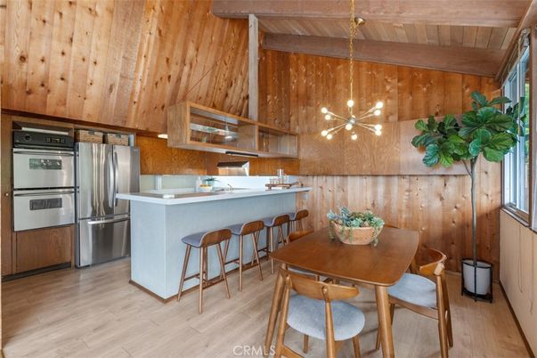 Dining room, Interior, Kitchen, Pendant Lights, Stainless Steel Appliances, Wooden Beams, Wooden Ceilings, Wood Texture Flooring, Wooden Walls