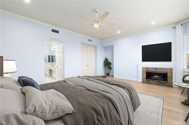 Bedroom, Fireplace, Interior, Recessed Lighting, Wood Texture Flooring