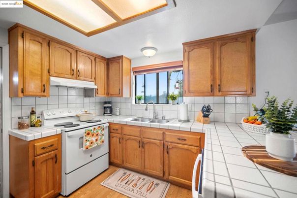 Interior, Kitchen, Tile Countertops, Wood Texture Flooring