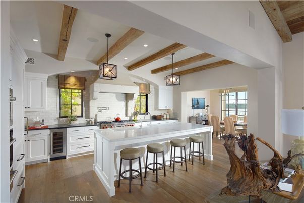 Chandelier, Dining room, Interior, Kitchen, Pendant Lights, Recessed Lighting, Stainless Steel Appliances, Wooden Beams, Wood Texture Flooring