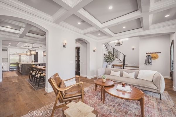 Chandelier, Interior, Kitchen, Living room, Pendant Lights, Recessed Lighting, Stainless Steel Appliances, Wood Texture Flooring