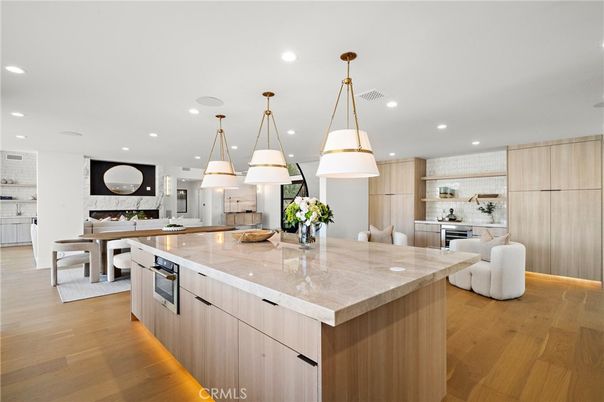 Dining room, Interior, Kitchen, Pendant Lights, Recessed Lighting, Stainless Steel Appliances, Wood Texture Flooring