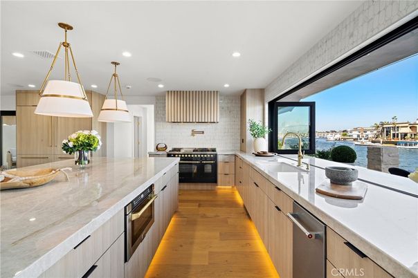 Interior, Kitchen, Pendant Lights, Recessed Lighting, Stainless Steel Appliances, Water, Wood Texture Flooring