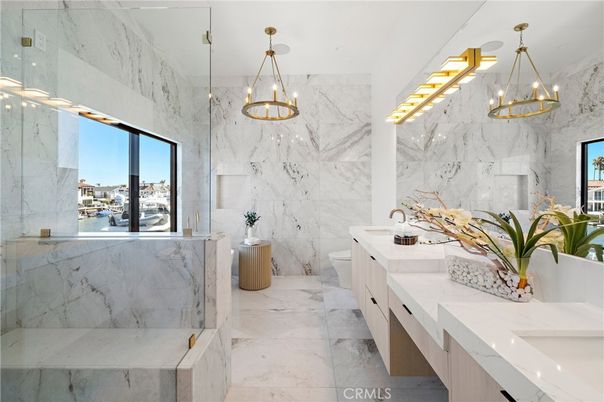 Bathroom, Dual Sink Vanities, Glass Shower, Interior, Marble, Marble Walls, Pendant Lights