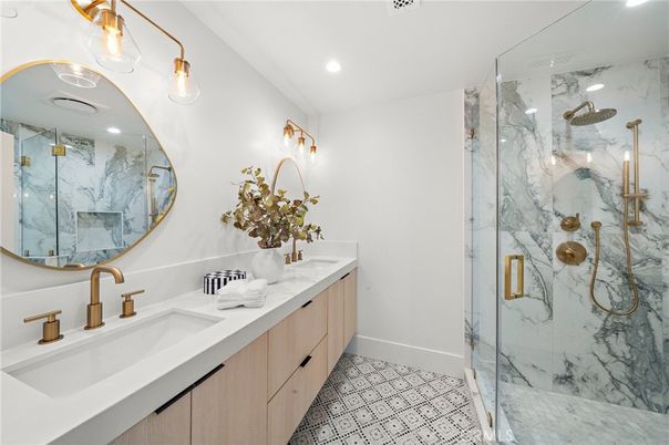 Bathroom, Dual Sink Vanities, Glass Shower, Interior, Marble Walls, Recessed Lighting