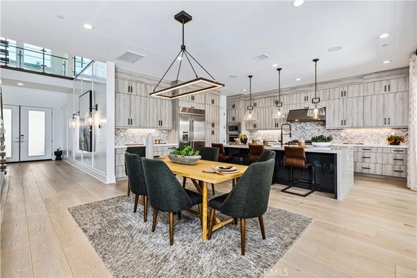 Dining room, Interior, Kitchen, Pendant Lights, Recessed Lighting, Stainless Steel Appliances, Wood Texture Flooring