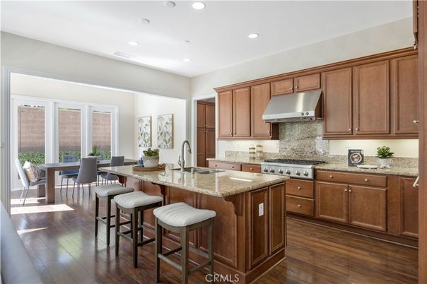 Dining room, Interior, Kitchen, Recessed Lighting, Stainless Steel Appliances, Wood Texture Flooring