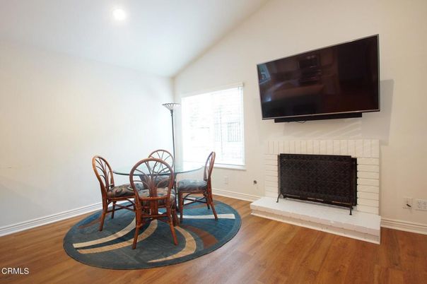 Dining room, Fireplace, Interior, Recessed Lighting, Wood Texture Flooring