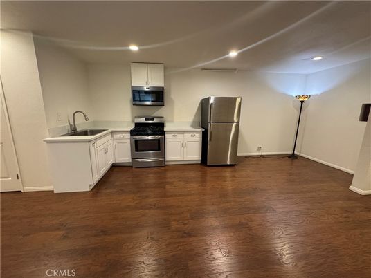 Interior, Kitchen, Recessed Lighting, Stainless Steel Appliances, Wood Texture Flooring