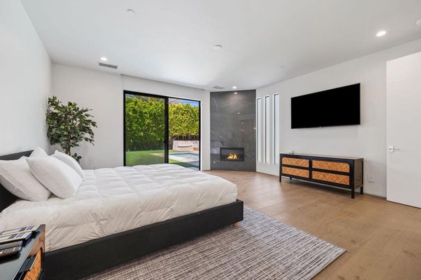 Bedroom, Fireplace, Interior, Recessed Lighting, Wood Texture Flooring