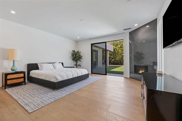 Bedroom, Fireplace, Interior, Recessed Lighting, Wood Texture Flooring
