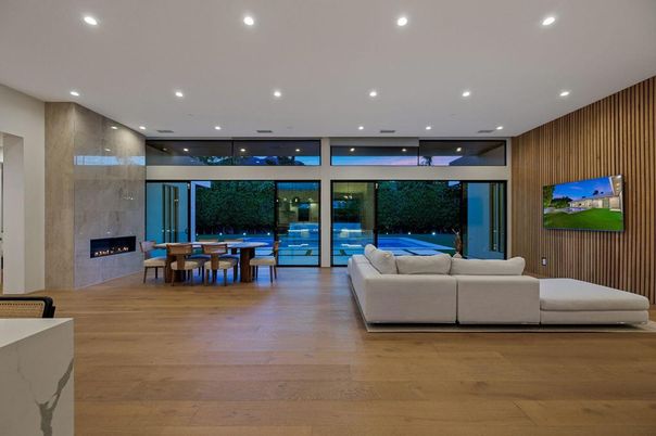 Dining room, Fireplace, Interior, Living room, Recessed Lighting, Wood Texture Flooring