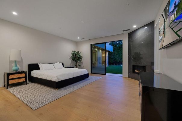 Bedroom, Fireplace, Interior, Recessed Lighting, Wood Texture Flooring