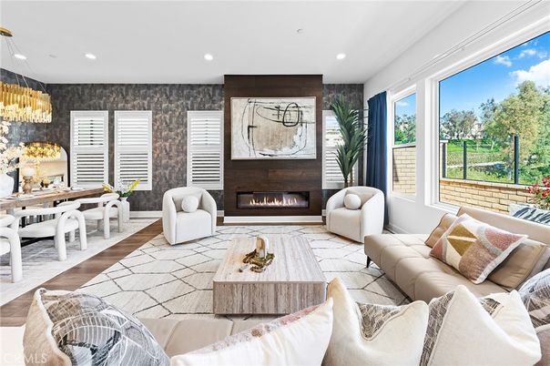 Chandelier, Dining room, Fireplace, Interior, Living room, Recessed Lighting, Wood Texture Flooring