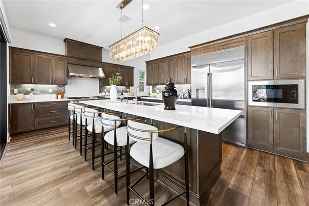 Chandelier, Interior, Kitchen, Recessed Lighting, Stainless Steel Appliances, Wood Texture Flooring