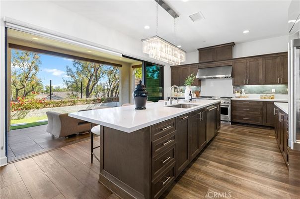Chandelier, Interior, Kitchen, Recessed Lighting, Stainless Steel Appliances, Wood Texture Flooring
