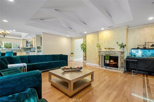Chandelier, Fireplace, Interior, Living room, Recessed Lighting, Wood Texture Flooring