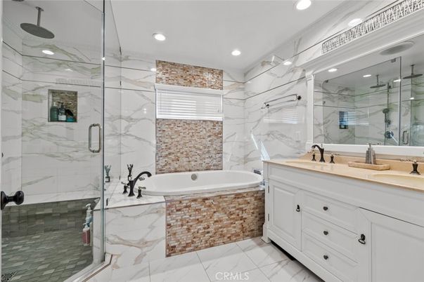 Bathroom, Dual Sink Vanities, Glass Shower, Interior, Marble, Marble Walls, Recessed Lighting