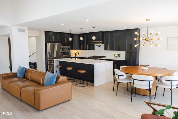 Dining room, Interior, Kitchen, Living room, Pendant Lights, Recessed Lighting, Stainless Steel Appliances, Wood Texture Flooring