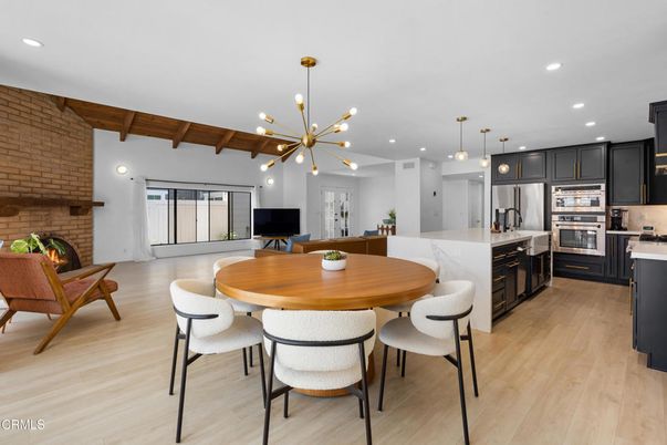 Dining room, Fireplace, Interior, Kitchen, Pendant Lights, Recessed Lighting, Stainless Steel Appliances, Stone Walls, Wooden Beams, Wood Texture Flooring