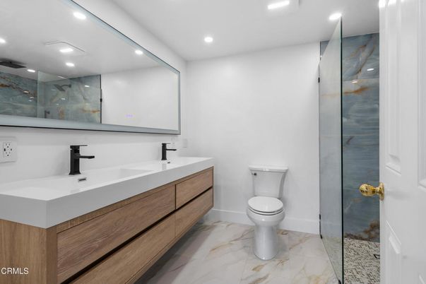 Bathroom, Dual Sink Vanities, Glass Shower, Interior, Marble, Recessed Lighting