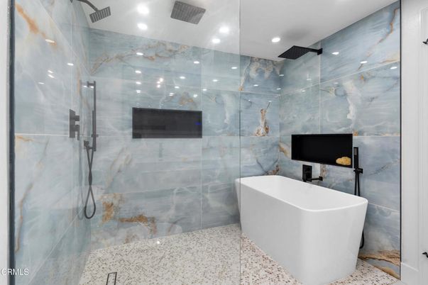 Bathroom, Free Standing Baths, Glass Shower, Interior, Marble Walls, Recessed Lighting
